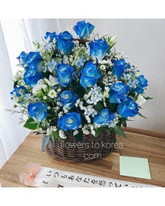 Blue Roses in Wood Basket