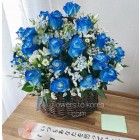 Blue Roses in Wood Basket