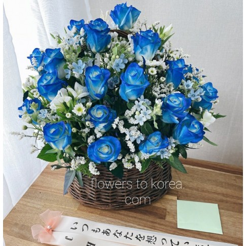 Blue Roses in Wood Basket